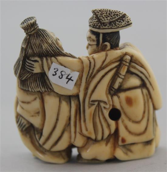 A Japanese ivory netsuke of Tadamori catching the oil thief, Edo period, 5.2cm